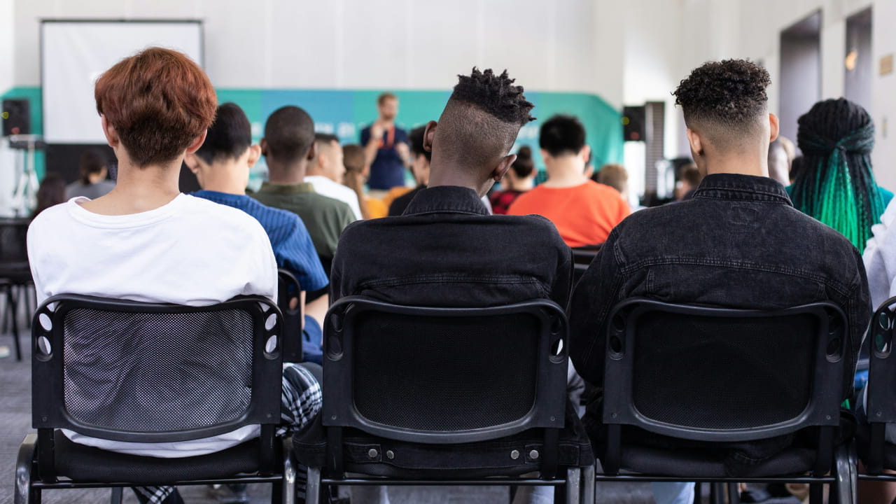Students attending a financial education workshop